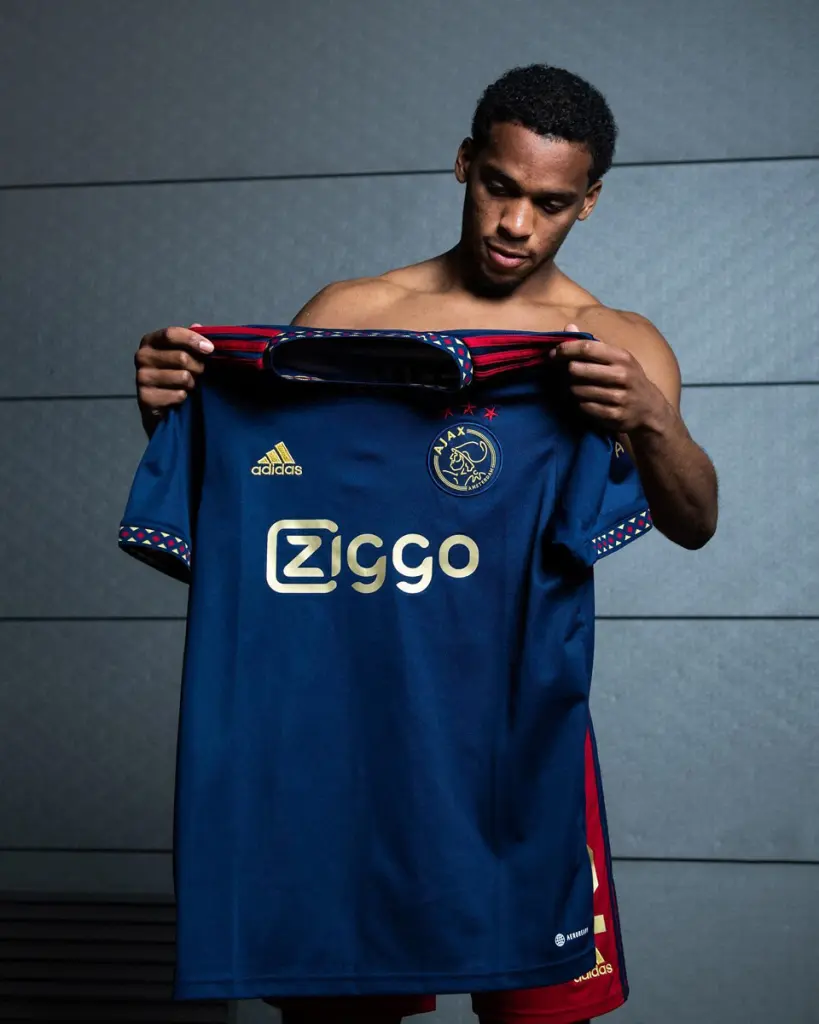 The New Champions' Attire: An In-depth Look at Ajax's 2022-23 Away Kit in Collaboration with Adidas